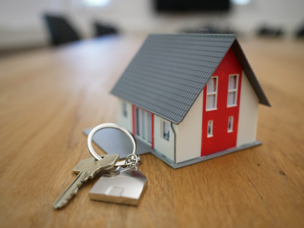 Small house with keys on table